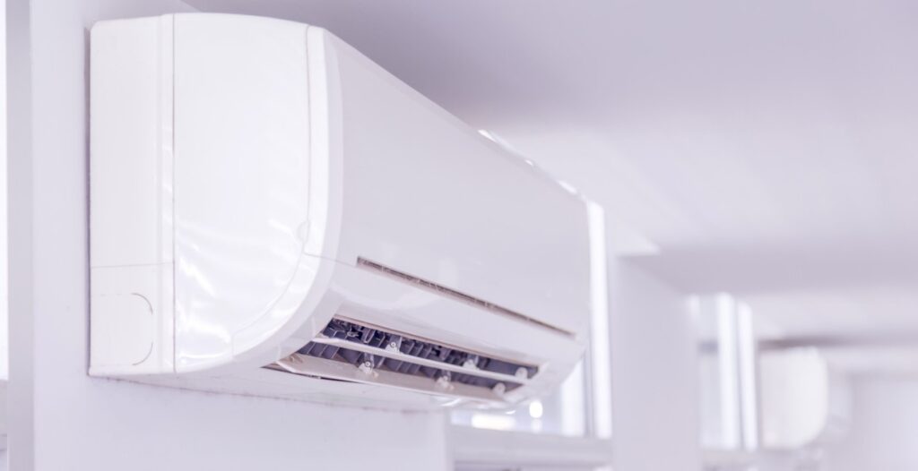 White ductless mini-split mounted on a wall